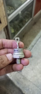 SanRex SSG50C50 Stud Diode – 50A 500V (Japan) - a silver-coloured metal stud-mount diode with a top terminal lug held in a hand.