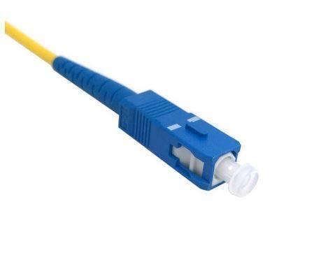 SC to SC Fiber Patch Cord Cable 3M - a close-up of a blue SC fiber optic connector attached to a yellow cable with a white protective dust cap.