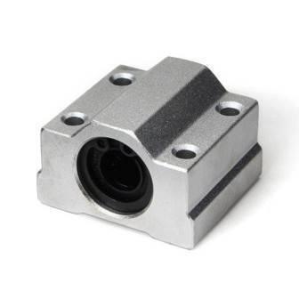 Scs8uu 8mm Linear Motion Ball Bearing Machinery Slide Bushing CNC - a silver-colored rectangular metal block with four mounting holes and a central circular opening containing a bushing.