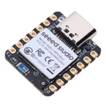 Seeeduino XIAO BLE SENSE NRF52840 | Bluetooth-compatible BLE 5.0 | Arduino Development Board - Digilog.pk - a black rectangular development board with a USB-C port, a metal shield, and gold-plated pin headers.