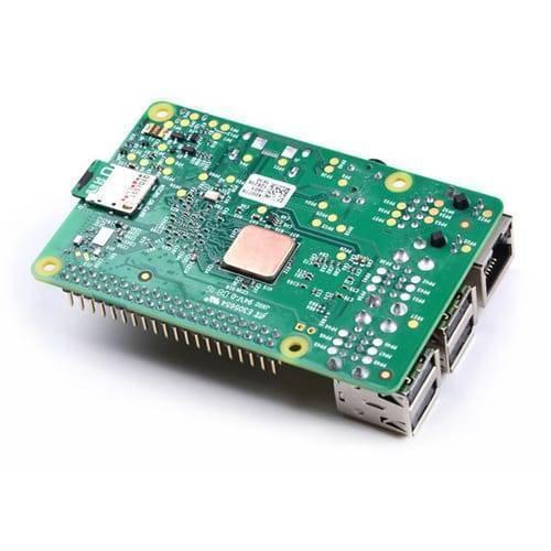 Self Adhesive Pure Copper Heat Sink For Raspberry Pi 3 Pi 3 B+ - a green Raspberry Pi circuit board with a square copper heat sink on its center.