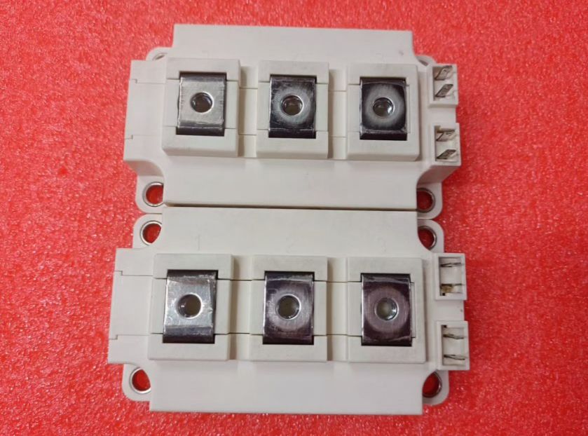 Semikron 300A Infineon FF300R12KT4 IGBT Module, 1200 V | Digilog.pk - two white rectangular power electronic modules with three metal terminals and two small side pins.