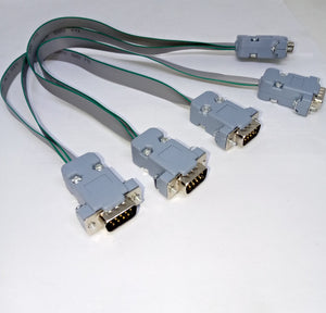 Serial Modbus Daisy Chain Cable - four grey DB9 connectors linked by flat ribbon cables in a series arrangement on a white background.