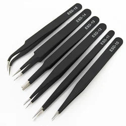 Set of 6 Non-Magnetic Stainless Steel Tweezers - ESD Safe - six black tweezers labeled ESD-10 through ESD-15 arranged diagonally on a white background.