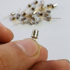 Sharp Infrared Emitting LED Diode GL514A - a small silver metal-can component with a glass top and two gold-coloured pins.