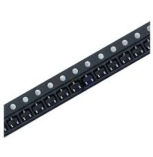 SI2300 2300 30V 3.6A N-Channel SMD MOSFET SOT-23 - shown as a strip of multiple black electronic components arranged in a row with silver circular feed holes.