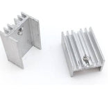 Silver Aluminium To 220 Heat Sink - two pieces of silver-coloured aluminium heat sinks with threaded mounting holes.