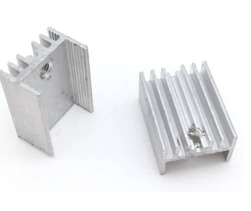 Silver Aluminium To 220 Heat Sink - two pieces of silver-coloured aluminium heat sinks with threaded mounting holes.