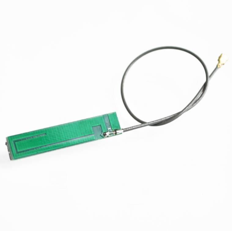 SIM800L GSM Module Micro SIM Card Board - shown as a rectangular green PCB antenna with an attached black coaxial cable and a small gold connector.