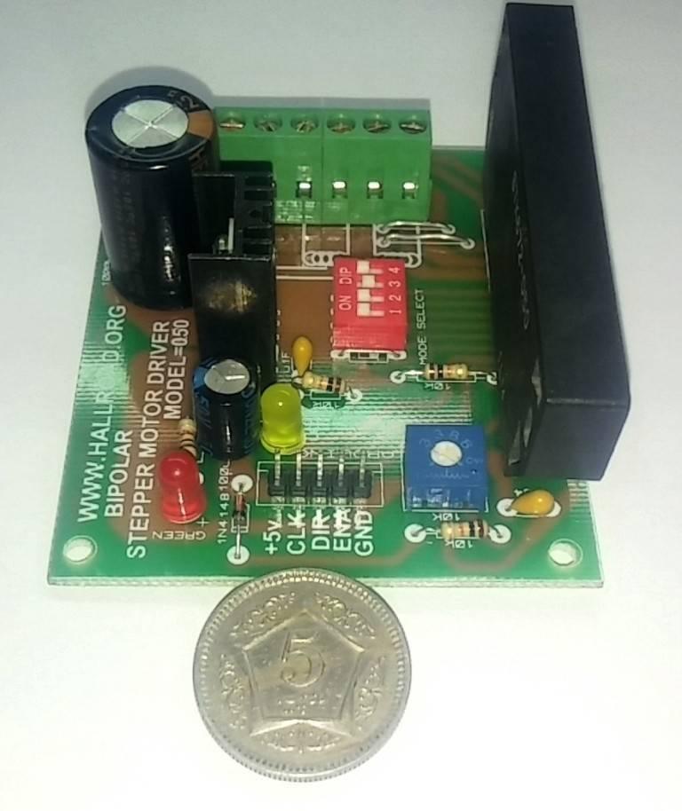 Sine Wave STK672-050 3amp Unipolar 6 Wires Stepper Motor Driver - a green circuit board with a black heat sink, dip switches, LEDs, and a terminal block.