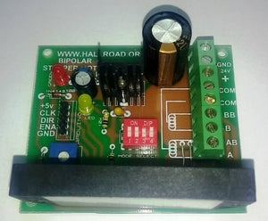 Sine Wave STK672-050 3amp Unipolar 6 Wires Stepper Motor Driver - a green PCB with a large black heatsink, dip switches, LEDs, and screw terminals.
