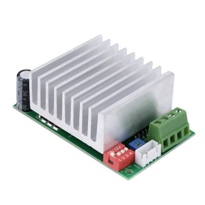 Single Axis TB6600 4.5A DC 12V To 45V Two Phase Hybrid Stepper Motor Driver Controller - a large silver heatsink, a red 4-position DIP switch, a blue potentiometer, and green terminals.