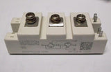 SKM100GB128D 145A 1200V Semikron IGBT Module - a white rectangular power electronic component with three top screw terminals and side blade connectors.