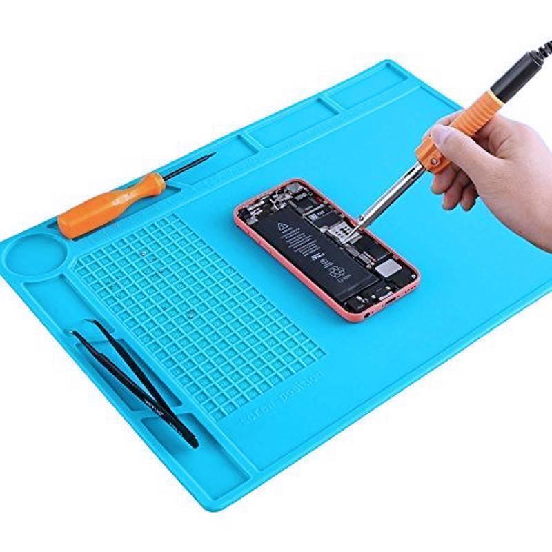 Small Silicone Mat Soldering And Repairing Mat - a blue rectangular work mat featuring a screwdriver, tweezers, and a hand using a soldering iron.