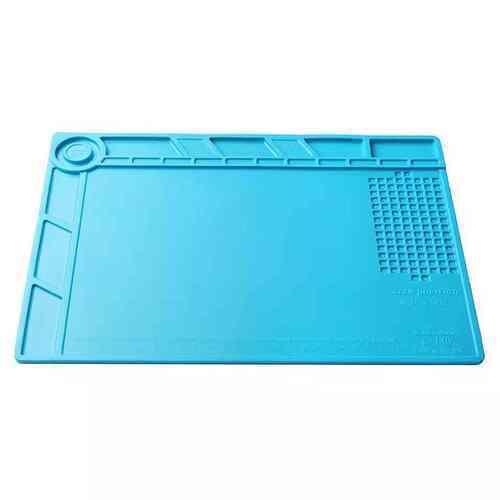 Small Silicone Mat Soldering And Repairing Mat - a rectangular light blue silicone work surface featuring recessed compartments and a grid section.