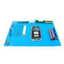 Small Silicone Mat Soldering And Repairing Mat - a grid, compartments, a disassembled smartphone, and various repair tools.