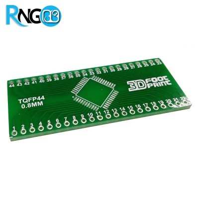 SMD adapter of TQFP44 adapter board SMD to DIP - a green rectangular PCB with a central TQFP44 footprint and two rows of numbered through-hole pins along the long edges.