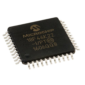 SMD adapter of TQFP44 adapter board SMD to DIP - Microchip 18F46K22, a black square-shaped TQFP44 microcontroller chip with metallic pins on all four sides and text printed on the top surface.