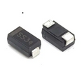 SMD Schottky Diode SS34 (1N5822) 3A/40V - two black rectangular surface-mount diodes with silver metal terminals, one showing the text "SS34" and a striped cathode mark.