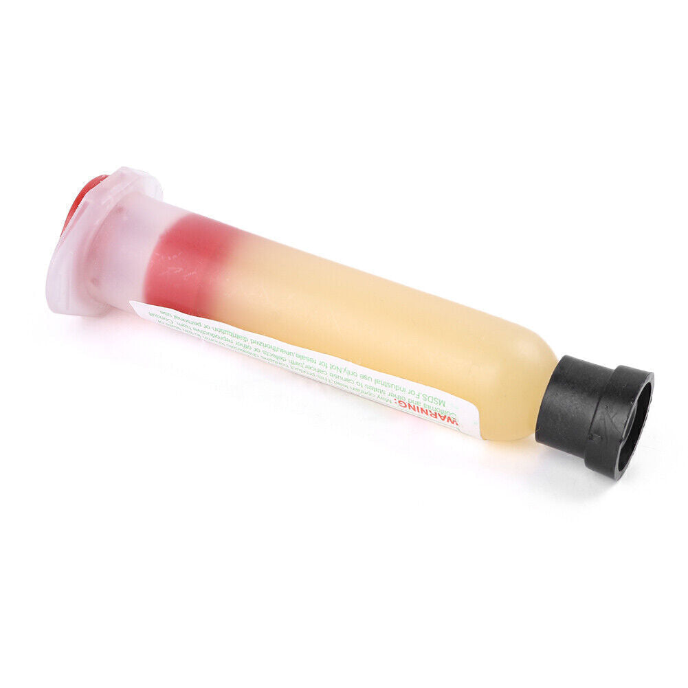 SMD Soldering Paste Flux Grease SMT IC 10CC Repair Tool Solder - a yellow and red paste contained in a translucent plastic syringe with a black cap.