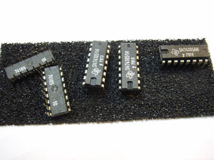 Sn 74185 An Texas Instruments Binary-to-bcd Converter DIP 16 - four black 16-pin DIP integrated circuits arranged on a piece of black conductive foam.