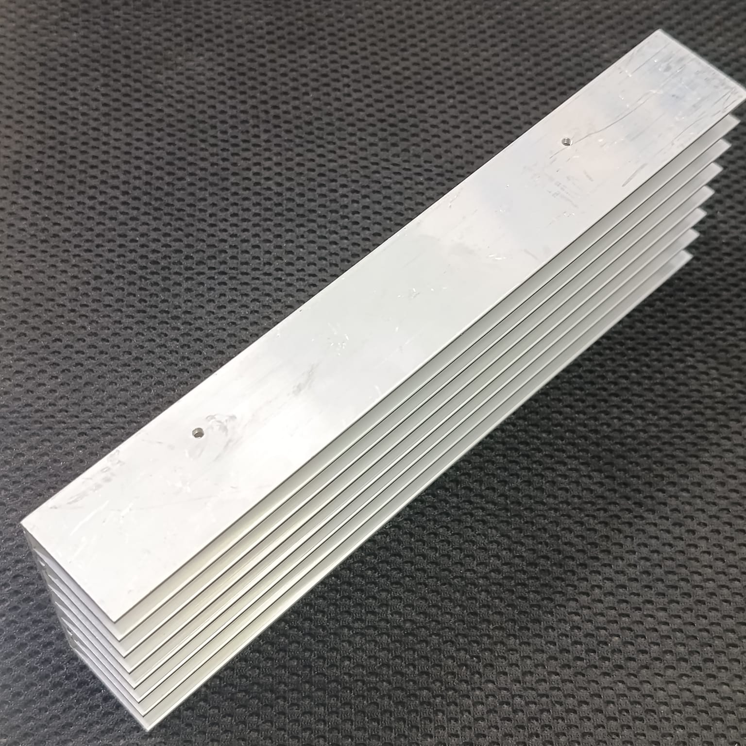 Solar Inverter Heat Sink 8 inch for 8 IGBT - a long, silver-coloured aluminum heat sink with multiple parallel cooling fins and two small drill holes.