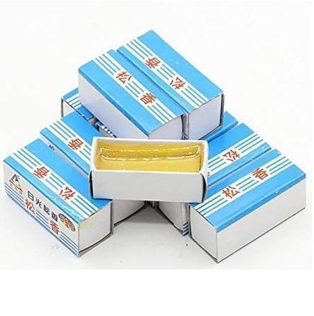 Solder Past Bon Beroza Baroza Broza Paste Bit Cleaner Rosin Paste White Smoke Past - a stack of small, rectangular boxes with blue and white striped packaging, one of which is open to reveal yellow rosin.