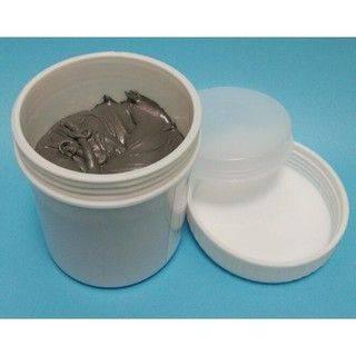 Soldering Flux Paste 500gram Soldering Tin Qlg Factory Solder Welding Rosin Flux SN63PB37 - an open white plastic jar containing grey soldering paste with its matching white lid placed beside it on a blue surface.