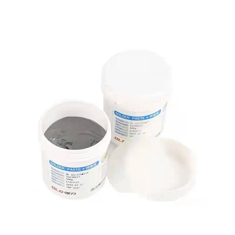 Soldering Flux Paste 500gram Soldering Tin Qlg Factory Solder Welding Rosin Flux SN63PB37 - two white plastic jars of solder paste, one open to reveal the grey paste and one closed with a lid nearby.