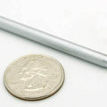 Soldering Iron Bit For 30 Watt Soldering Irons Copper With Corrosion Resistant Coating - shown as a silver, pencil-shaped tip next to a US quarter coin.