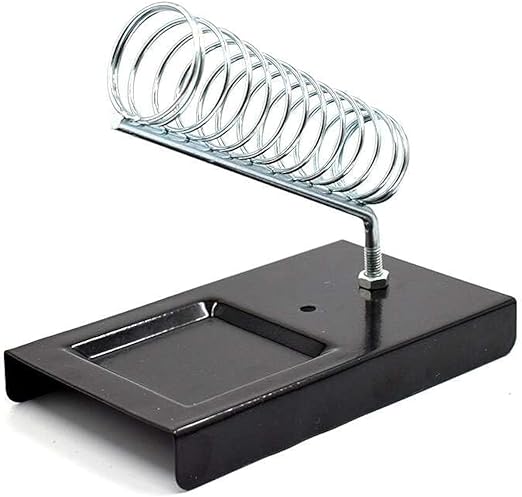 Soldering Iron Stand - a black metal base with a square recessed tray and a coiled silver wire holder attached by a nut and bolt.