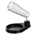 Soldering Iron Stand Metal Round - a black cast-iron base with a circular tray and an attached silver-colored coiled metal spring holder.