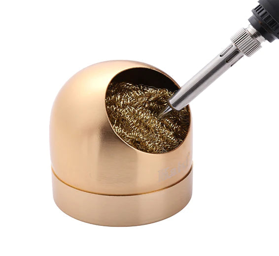Soldering Iron Tip Cleaner Welding Head Cleaning Steel Wire Brush With Stand Holder For BGA Soldering Station - a gold-colored metal stand containing brass wire with a soldering iron.