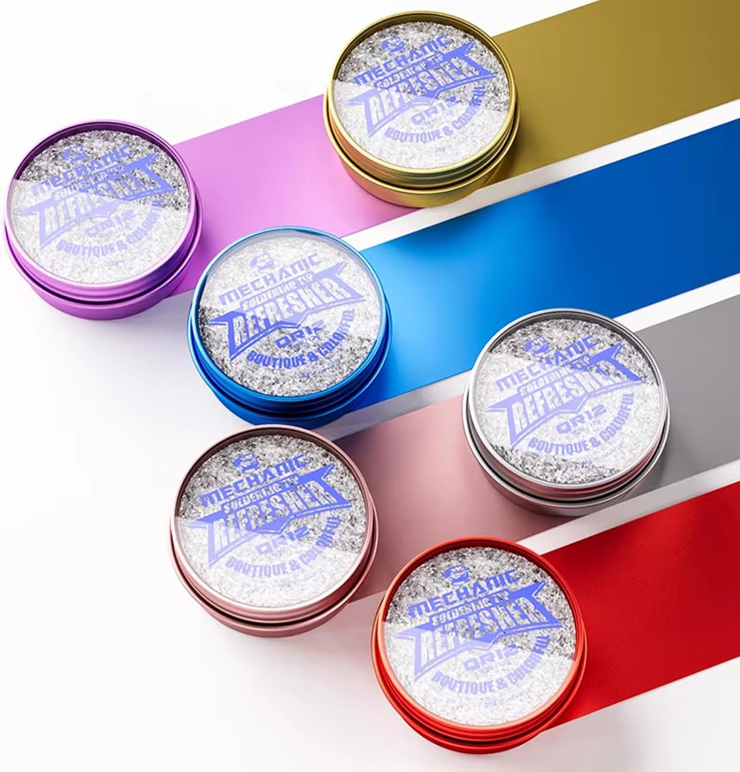 Soldering Iron Tip Cleaning Pastes Soldering Iron Tip Tinner Activators Tip Cleaner Removers Refreshing Repair Tool - six round metal tins in purple, gold, blue, silver, pink, and red, each containing silver cleaning paste.