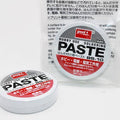 Soldering Paste High Quality - shown as two small, round white tins with red and black labels, one inside a clear plastic bag and one sitting in front.