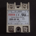 Solid State Relay 50VA Solid State AC Dimmer - a grey rectangular relay with four screw terminals and a label showing voltage and resistance specifications.
