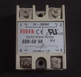 Solid State Relay 50VA Solid State AC Dimmer - a grey rectangular relay with four screw terminals and a label showing voltage and resistance specifications.