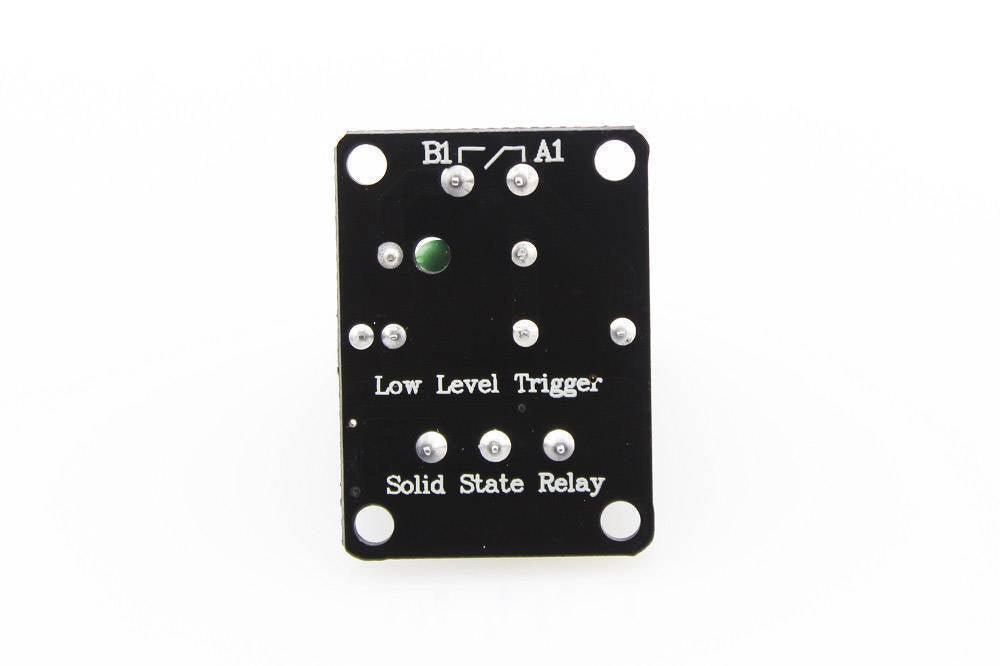 Solid State Relay Ssr Module 1 Channel For Arduino - the black underside of the PCB with soldered pins, mounting holes, and printed text.