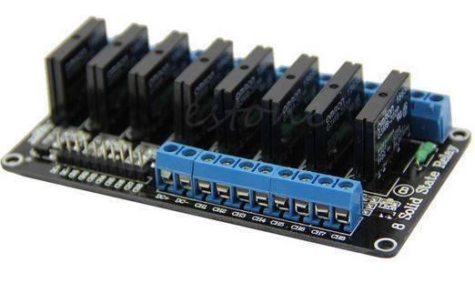 Solid State Relay Ssr Module 8 Channel 5V Omron For Arduino - a black circuit board with eight Omron relays, blue screw terminals, and pins.