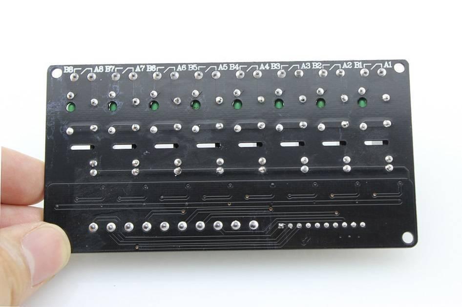 Solid State Relay Ssr Module 8 Channel 5V Omron For Arduino - shown as a black rectangular circuit board with eight labeled A and B terminal points.