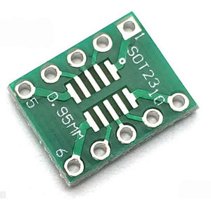 SOP10 S010 SOIC10 TSSOP10 MSOP10 TO DIP10 ADAPTER BOARD - a green rectangular printed circuit board with ten through-hole pins and surface-mount pads.