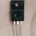 SP20150R 20A 150V Dual Schottky Barrier Rectifier Diode (TO-220F) Used - with three metal pins, shown in a close-up against a skin-toned background.