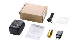 Speed-x BT450M Mini Portable Bluetooth+USB Printer 58mm - shown with its cardboard box, user manual, power adapter, USB cable, disc, and thermal paper roll.