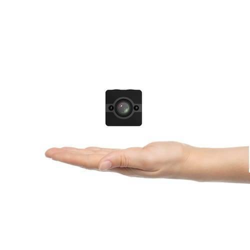 Spy Dvr 1080P Waterproof Camcorder HD Mini Camera SQ12 - a small black square camera floating above an open human hand.