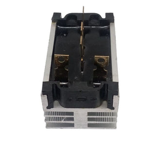SQL-80A THREE PHASE BRIDGE - a black and silver metal electronic component with four vertical metal terminal pins mounted on a finned heatsink base.
