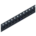 SS8550 Y2 PNP SMD Transistor SOT-23 for Arduino in Pakistan - a close-up of multiple black electronic components arranged in a row on a continuous plastic carrier tape.