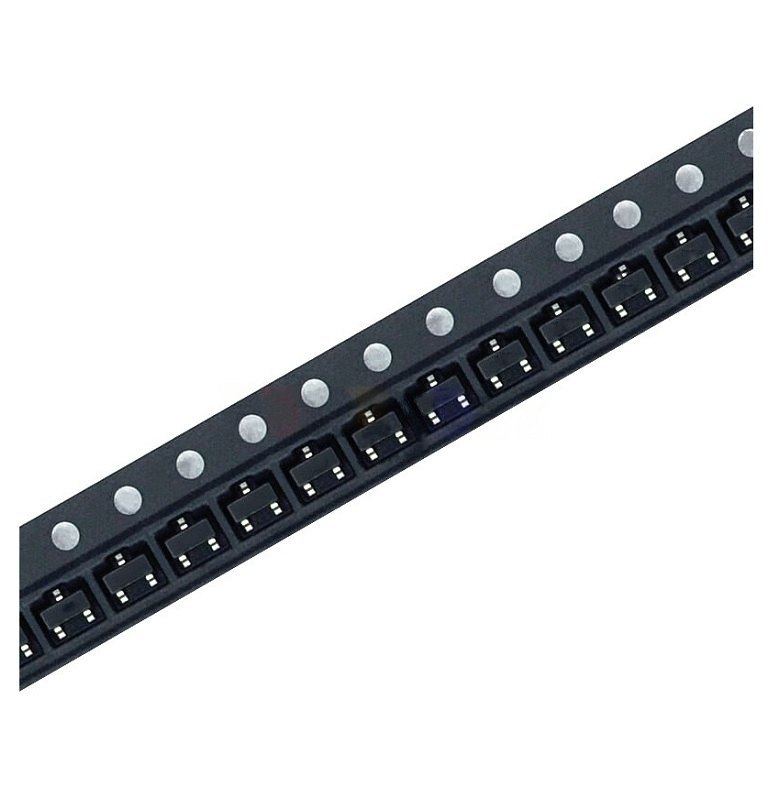 SS8550 Y2 PNP SMD Transistor SOT-23 for Arduino in Pakistan - a close-up of multiple black electronic components arranged in a row on a continuous plastic carrier tape.