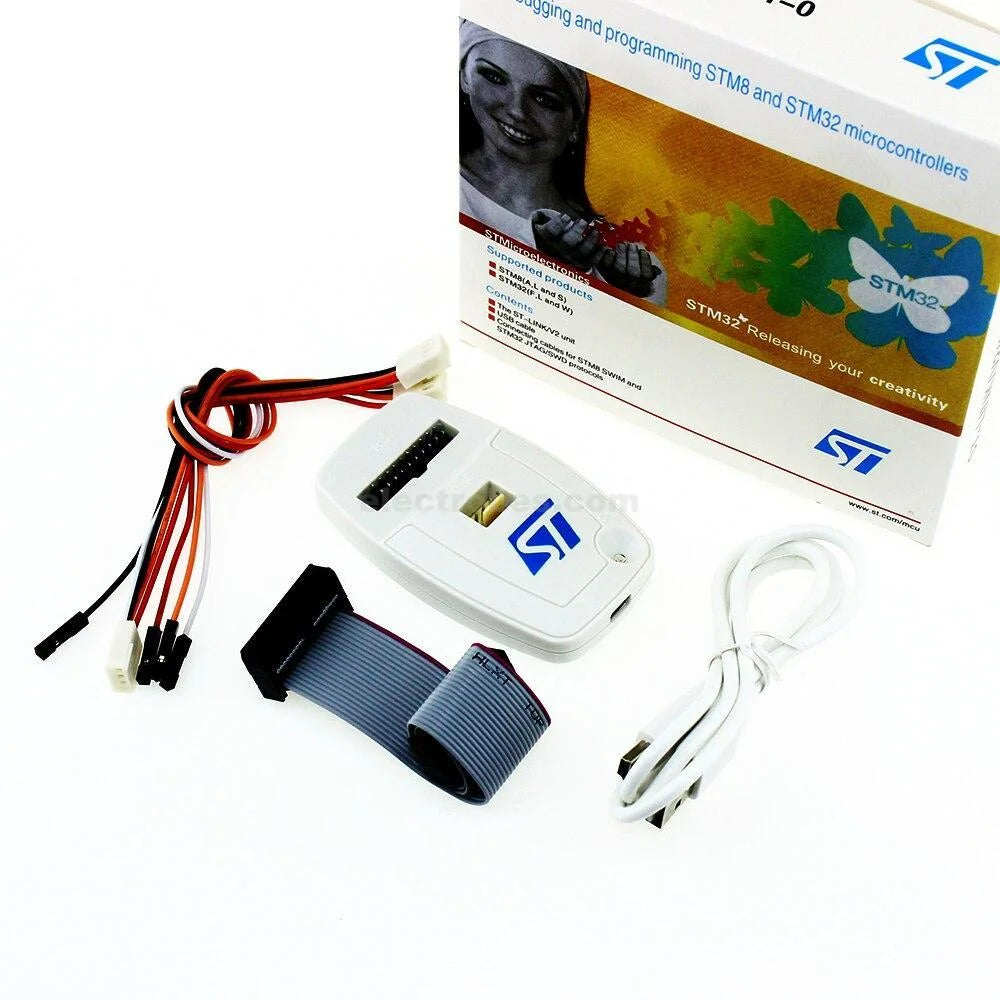 ST-Link V2 Debugger Programmer STM8 STM32 SWIM JTAG SWD - shown with its white box, a white USB cable, a grey ribbon cable, and a multi-colored wire harness.