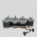 Stepper Motor Round body 4 wire bipolar stepper motor - a group of four grey and black motors with shafts and attached multi-colored wire cables.