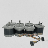 Stepper Motor Round body 4 wire bipolar stepper motor - a group of four grey and black motors with shafts and attached multi-colored wire cables.